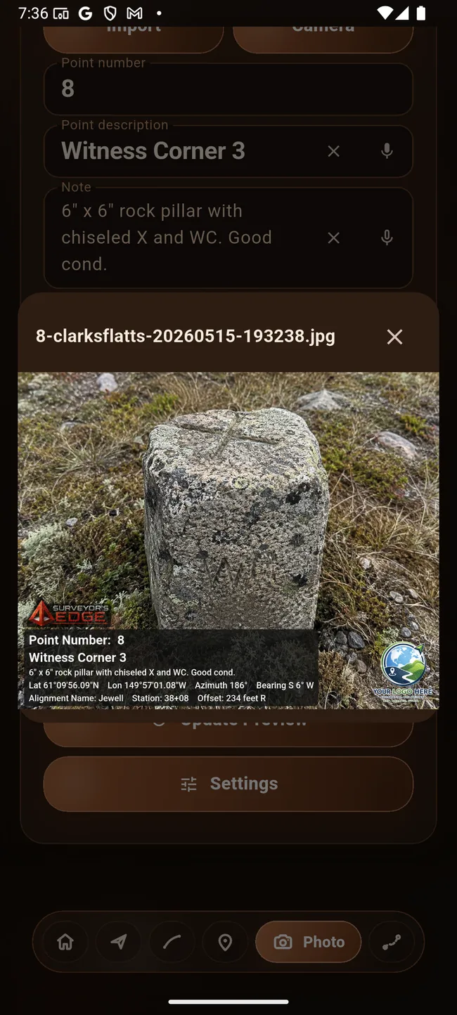Stamped monument photo with coordinate context